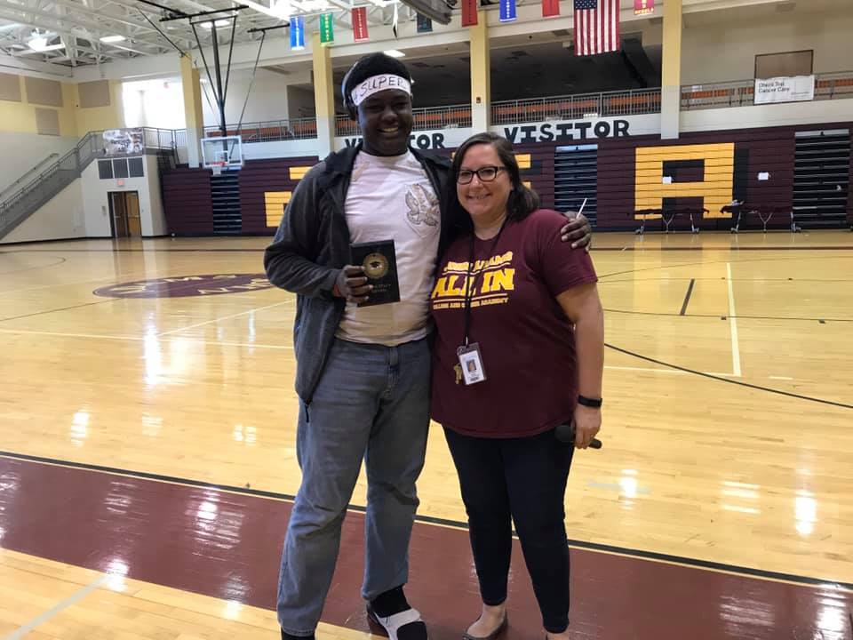 Kristen with a JACCA student.